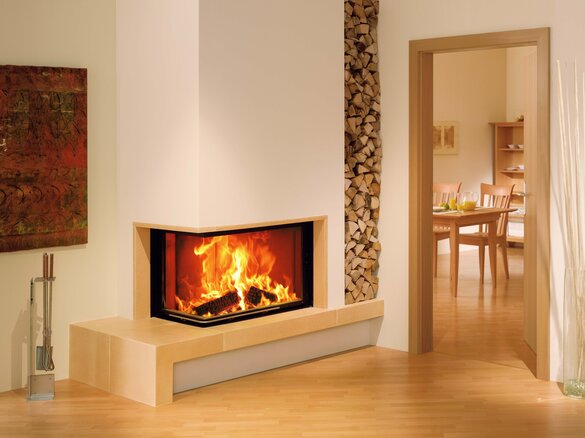 Tiled fireplace with fire shelf and height corner in sandstein medium | © Sommerhuber GmbH
