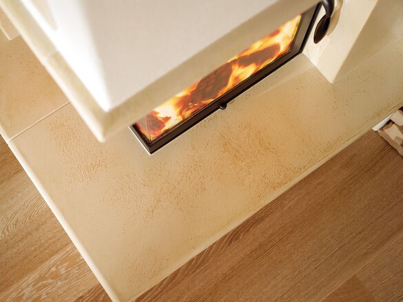 Tiled fireplace with real big tiles in solnhofen | © Sommerhuber GmbH
