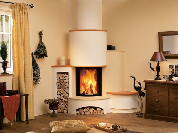 Tiled fireplace with real big tiles in sand and ocker dark | © Sommerhuber GmbH