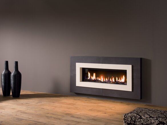 Tiled fireplace with fire shelf and fire frame in granit 2 dark and duene | © Sommerhuber GmbH