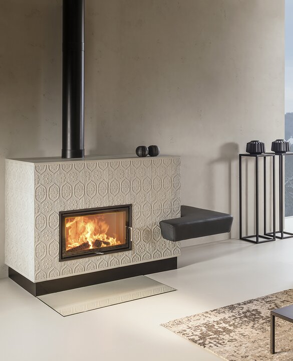 Image tiled stove with tile Tapetenmuster granit 2 licht | © Sommerhuber GmbH